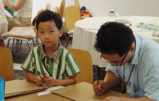 Father and child, art making pictures